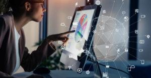 Woman using a CRM system on her computer